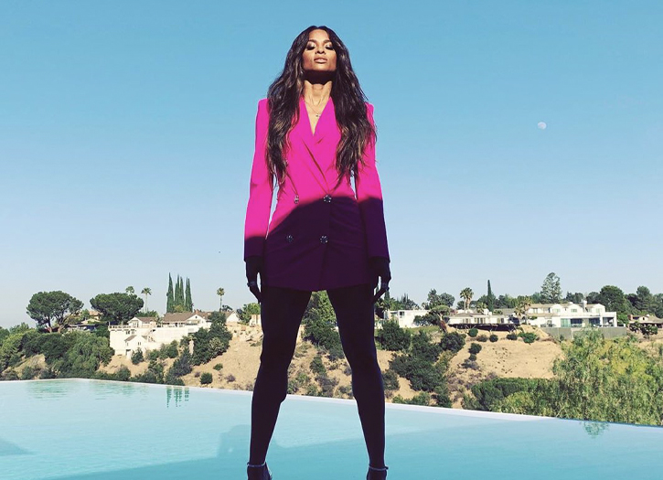 Ciara flashes her toned abs in hot pink dress as she celebrates launch of  storefront